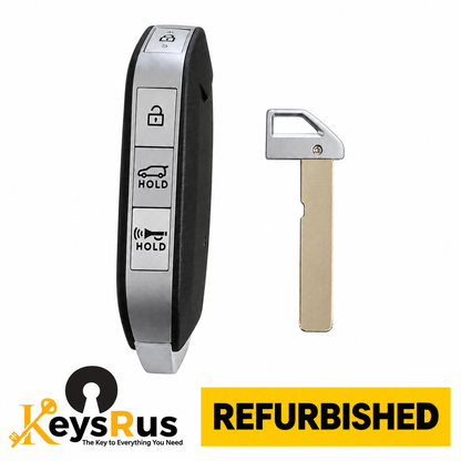 KeysRUs refurbished Kia Carnival 95440-R0840 smart key and emergency blade on white